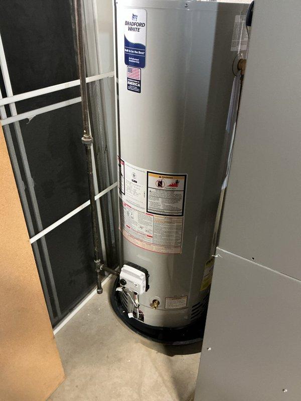 Replaced 40-gallon tall Bradford White water heater under manufacturer warranty coverage. The existing unit remained under warranty through 2027, with the tank replacement covered by warranty while labor and additional materials were provided separately. Installed new water heater with proper connections to existing copper plumbing lines, ensuring all piping, fittings, and circulation pump were correctly integrated. Verified all connections for proper operation and system functionality upon completion.