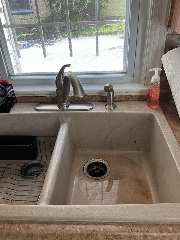 Repaired leaking kitchen sink by installing new faucet supply lines and shutoff valves. Also addressed issues with lavatory sink plumbing. Necessary replacement parts were ordered for shop delivery, with most components received and one item remaining on backorder for completion of repairs.