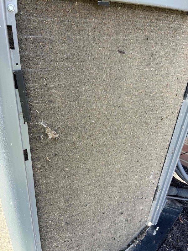 Completed routine maintenance on a 3-year-old outdoor air conditioning unit. Inspected and documented heavily soiled air filter requiring replacement due to significant dust and debris accumulation. Examined electrical components, capacitor, and wiring connections inside control panel, confirming all components operating within normal parameters with no visible corrosion or damage detected.
