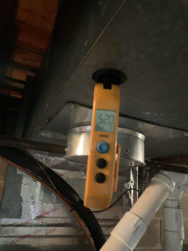 Completed BS-MVP cooling maintenance visit on 3-year-old air conditioning system. Performed comprehensive system inspection including blower wheel examination and supply air temperature verification, which measured 52.0°F indicating proper cooling operation. All components found operating within normal parameters with standard dust accumulation noted on blower assembly consistent with regular use.