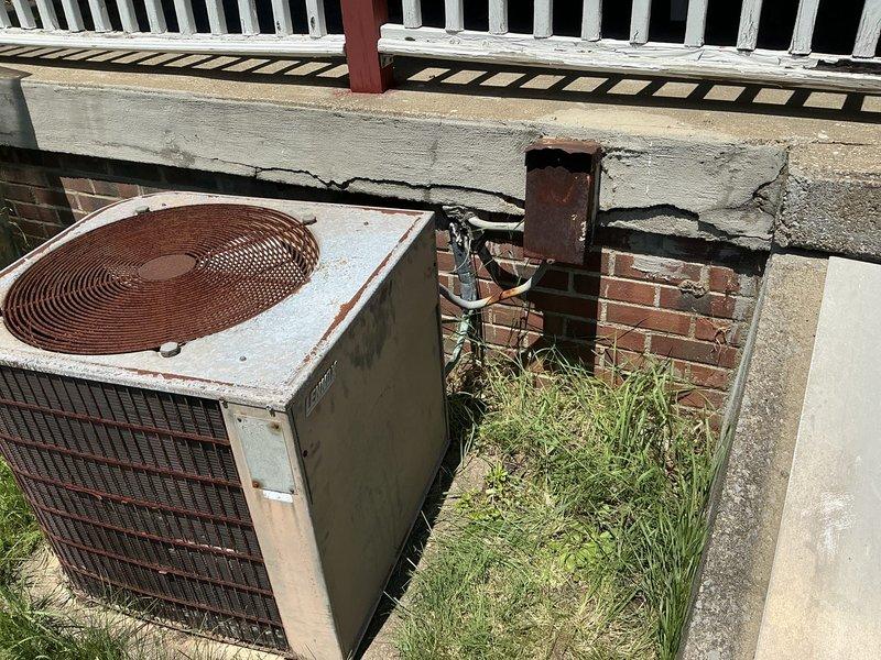 Conducted estimate for complete HVAC system replacement at residential property. Existing gas furnace and air conditioning system both exceeded 30 years of service life and were no longer operational, with the AC unit experiencing a no-cool condition. Upon inspection, the outdoor condenser unit displayed extensive weathering, significant rust deterioration on cabinet panels and mounting hardware, and overall end-of-life indicators. The aging equipment showed compromised structural integrity with discolored metal surfaces and corroded components. Provided comprehensive quote for full system replacement including new gas furnace and air conditioning unit to restore climate control functionality to the residence.