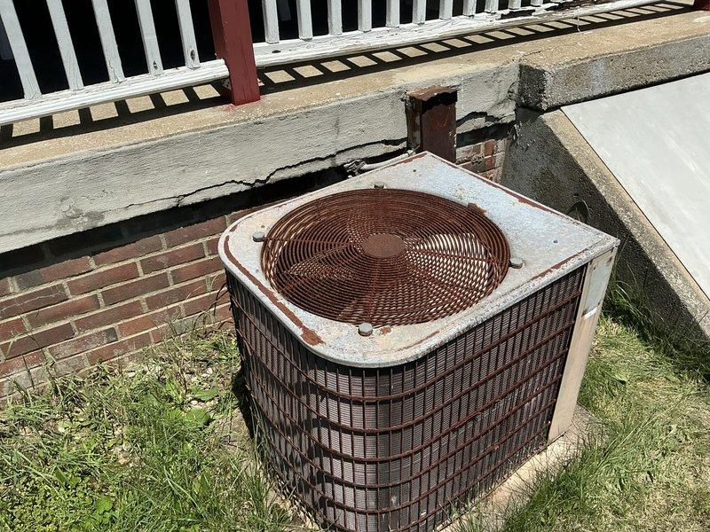Conducted estimate for complete HVAC system replacement at residential property. Existing gas furnace and air conditioning system both exceeded 30 years of service life and were no longer operational, with the AC unit experiencing a no-cool condition. Upon inspection, the outdoor condenser unit displayed extensive weathering, significant rust deterioration on cabinet panels and mounting hardware, and overall end-of-life indicators. The aging equipment showed compromised structural integrity with discolored metal surfaces and corroded components. Provided comprehensive quote for full system replacement including new gas furnace and air conditioning unit to restore climate control functionality to the residence.