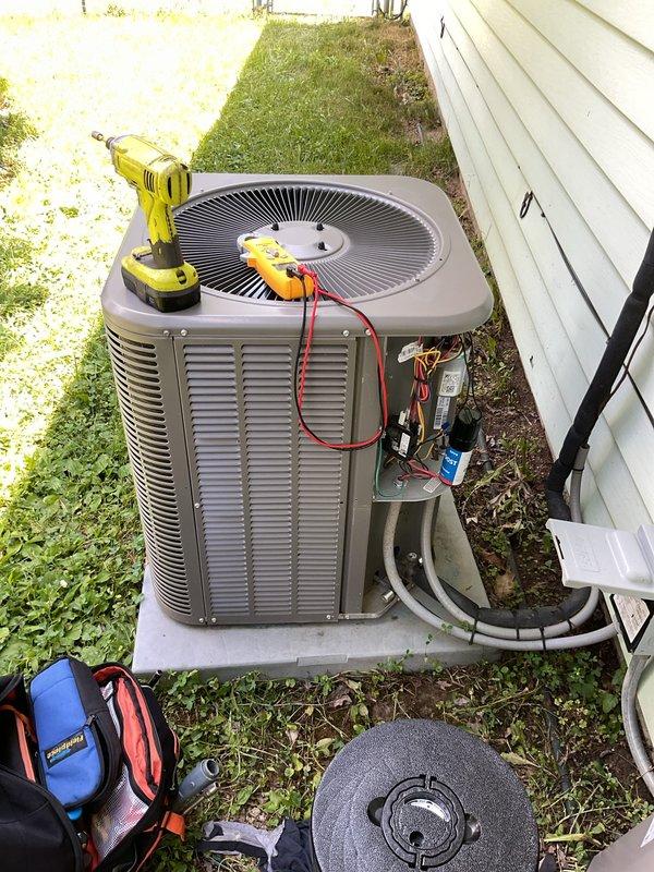 # HVAC Service - A/C

Responded to service call for outdoor condensing unit experiencing intermittent power cycling and unusual noise during operation. Upon arrival, confirmed unit was shutting down approximately 3 seconds after startup while condenser fan attempted to run. Opened electrical service disconnect panel and inspected internal components. Identified failed dual-run capacitor as primary cause of short cycling and abnormal operational sounds. Capacitor showed signs of electrical failure preventing proper motor startup for both compressor and fan motor. Replaced defective capacitor with new unit matching manufacturer specifications. Verified all electrical connections were secure, tested system operation, and confirmed unit now runs continuously without noise or power interruptions. System restored to normal operating condition.
