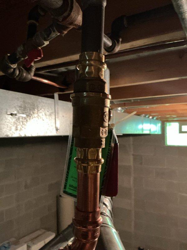 Installed a new 50-gallon Bradford White water heater with 6-year manufacturer warranty in basement utility area. Installation included new ball valve, thermal expansion tank with repositioned orientation from previous configuration, and complete copper piping connections. All components properly secured and tested for proper operation, with pressure relief valve and shutoff valves installed to code specifications.