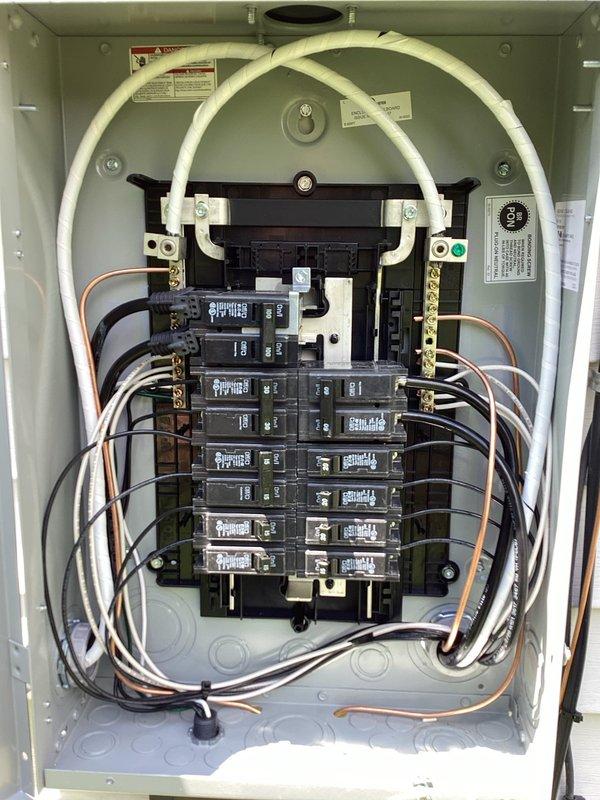 Completed 100-amp service upgrade with necessary grounding system improvements and installation of exterior disconnect to meet 2023 NEC requirements. Installed new main electrical panel with proper circuit breaker arrangement, neutral and ground bus bars, and organized branch circuit wiring. Added whole home surge protection device to safeguard electrical system and connected equipment from voltage spikes.