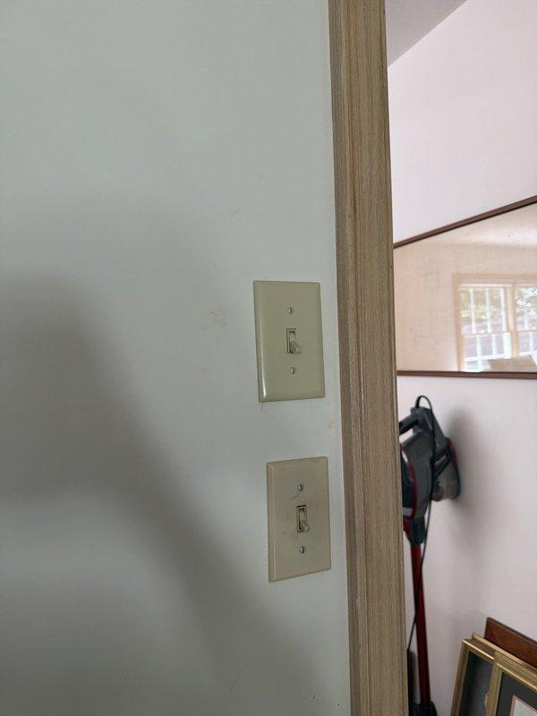Completed installation of two customer-provided pendant light fixtures over kitchen island, replacing existing fixtures. Replaced malfunctioning three-way switch at top of stairway controlling ceiling fan circuit. Installed new duplex receptacle in hallway and new GFCI receptacle on kitchen counter to ensure proper ground fault protection and code compliance.