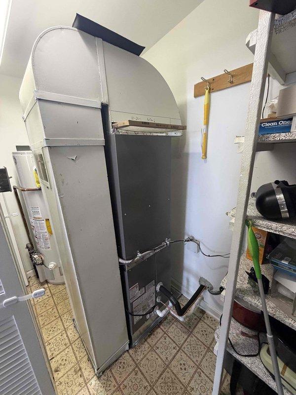 Completed full HVAC system installation in residential utility closet, including downflow 80% efficiency gas furnace and air conditioning system. Installed new furnace unit with proper venting configuration, connected metallic ductwork and supply plenum to existing distribution network, and established all necessary gas line connections using flexible connector. Configured system for downflow application to match existing infrastructure layout. All equipment secured, tested for proper operation, and left in full working condition.