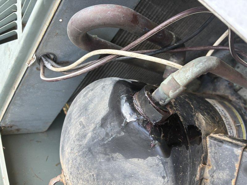 Responded to no-cool call on 30-year-old outdoor condensing unit with non-operational fan motor. Upon arrival, found compressor and condenser coils heavily soiled with dirt and debris accumulation affecting heat transfer efficiency. Performed thorough coil cleaning using foaming coil cleaner to remove years of built-up contamination from condenser fins and surrounding components. Due to advanced age of equipment and extent of wear observed on compressor and refrigerant lines, recommended system replacement as most cost-effective long-term solution.
