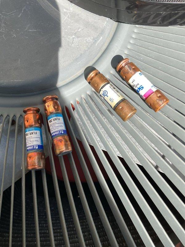 Responded to service call for 16-year-old residential air conditioning system with non-operational condenser fan. Upon inspection, diagnosed failed capacitor preventing fan motor operation. Replaced defective dual-run capacitor with properly rated unit, restoring full system functionality and verifying proper fan operation before departure.