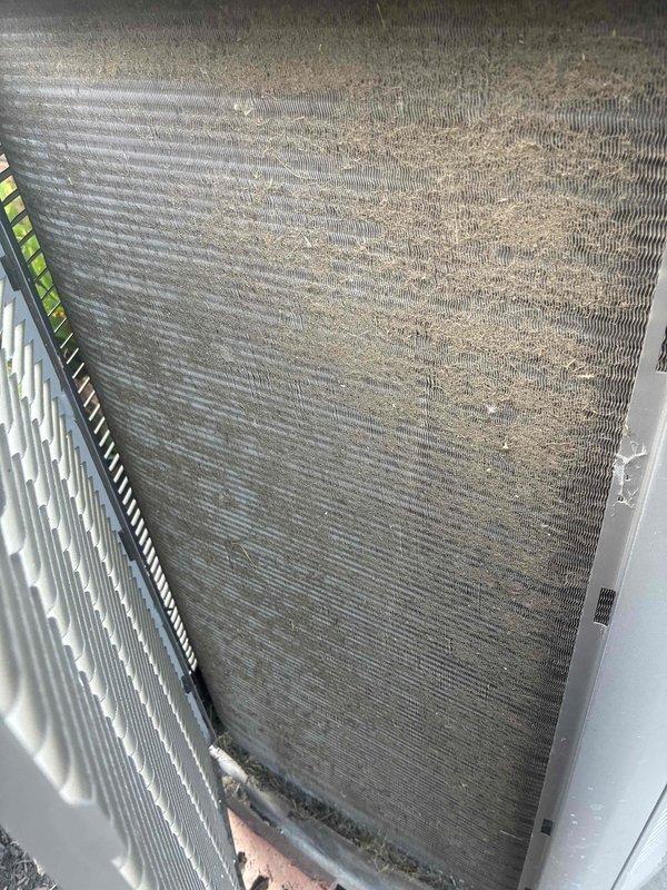 Performed comprehensive cooling system tune-up on 7-year-old air conditioning unit. Upon inspection, discovered heavily soiled condenser coil with significant dirt and debris accumulation restricting airflow, which was cleaned to restore proper heat transfer efficiency. Conducted electrical diagnostics using digital multimeter, identifying frost buildup on refrigeration components indicating potential airflow restriction or refrigerant-related issues. Verified electrical connections, measured system voltages, and ensured all wiring terminals were secure and properly functioning.