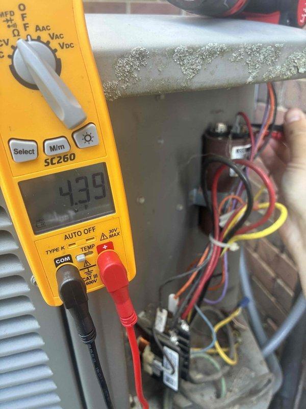 Performed comprehensive cooling system tune-up on 7-year-old air conditioning unit. Upon inspection, discovered heavily soiled condenser coil with significant dirt and debris accumulation restricting airflow, which was cleaned to restore proper heat transfer efficiency. Conducted electrical diagnostics using digital multimeter, identifying frost buildup on refrigeration components indicating potential airflow restriction or refrigerant-related issues. Verified electrical connections, measured system voltages, and ensured all wiring terminals were secure and properly functioning.