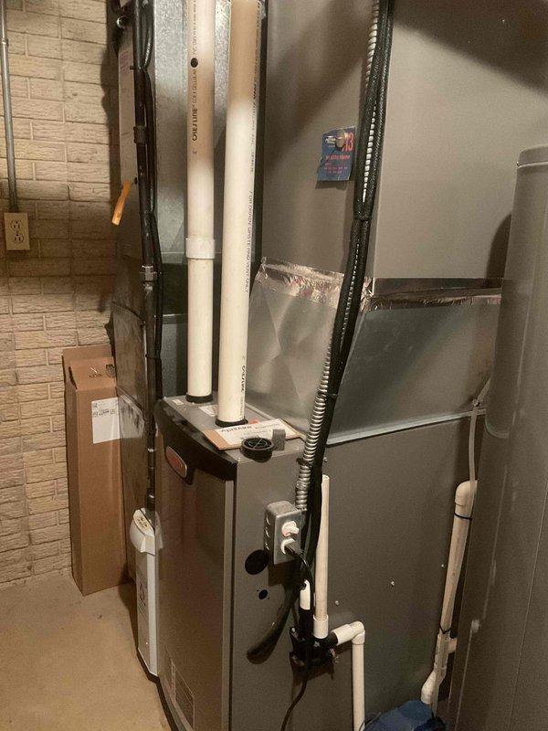 Completed preventive maintenance cooling visit on 5-year-old residential HVAC system. Performed standard inspection of furnace and air handling equipment, verified proper operation of condensate drainage system including PVC piping and connections, and checked electrical components and ductwork connections. All equipment found operating within normal parameters with no immediate service needs identified.