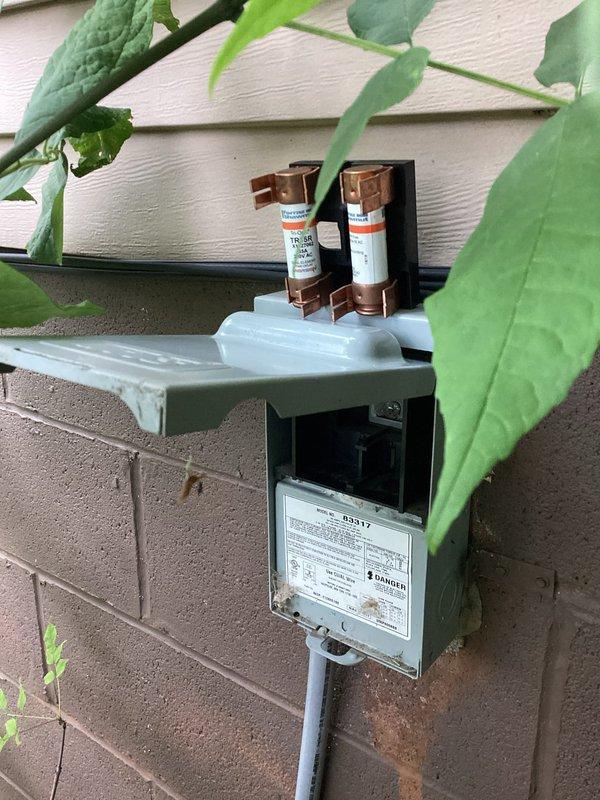 Completed scheduled MVP cooling maintenance visit on a 10-year-old system. Inspected evaporator coil assembly and verified proper operation, checked electrical disconnect and fuses at outdoor unit, and documented system condition with photos. All components found in satisfactory working condition with no immediate repairs required.