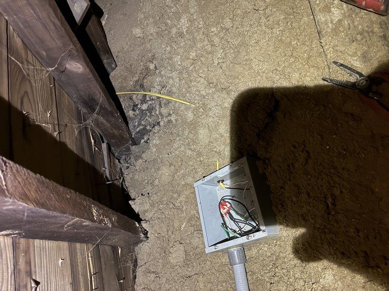 Installed a dedicated 20-amp circuit with arc fault breaker to serve a second-floor bedroom AC outlet. Routed exterior-grade conduit up the outside of the home into the attic space, then fished wiring down through the wall cavity to tie into the existing outlet box. All work completed to code with proper AFCI protection for the bedroom circuit.