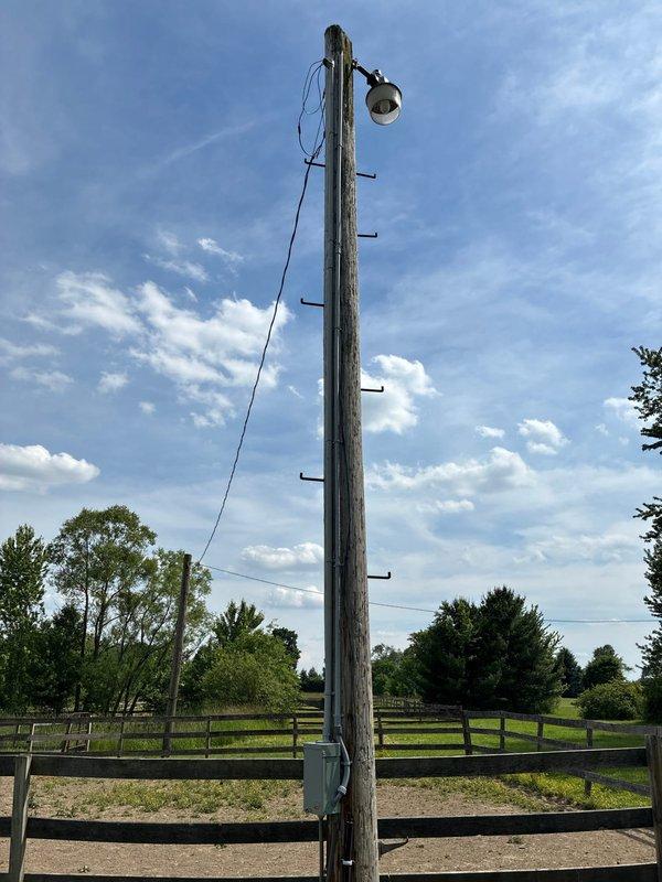 Installed new weather-resistant sub panel on utility pole with new wiring run through conduit to supply power and lighting. Ran new electrical service to shed and replaced outdated Federal Pacific panel with new sub panel. Installed weatherproof light fixture boxes inside shed to complete electrical upgrade.