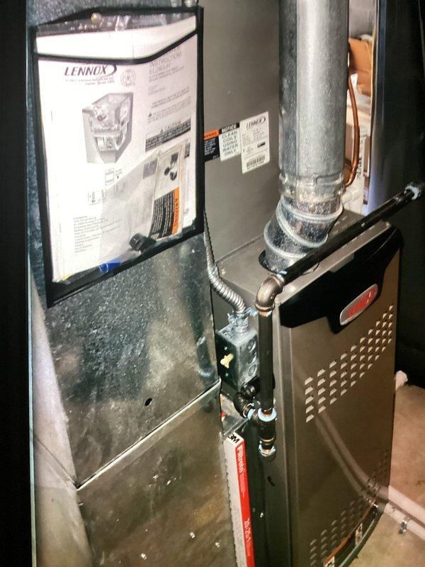 Completed MVP cooling maintenance visit on 7-year-old Lennox system. Performed comprehensive inspection of outdoor condensing unit, verifying proper operation of contactor, capacitor, and electrical connections. All components showed normal aging with capacitor displaying minor discoloration but testing within acceptable parameters. Inspected indoor furnace unit and refrigerant line connections, confirming proper insulation and secure fittings. System operating efficiently with no immediate service needs identified.