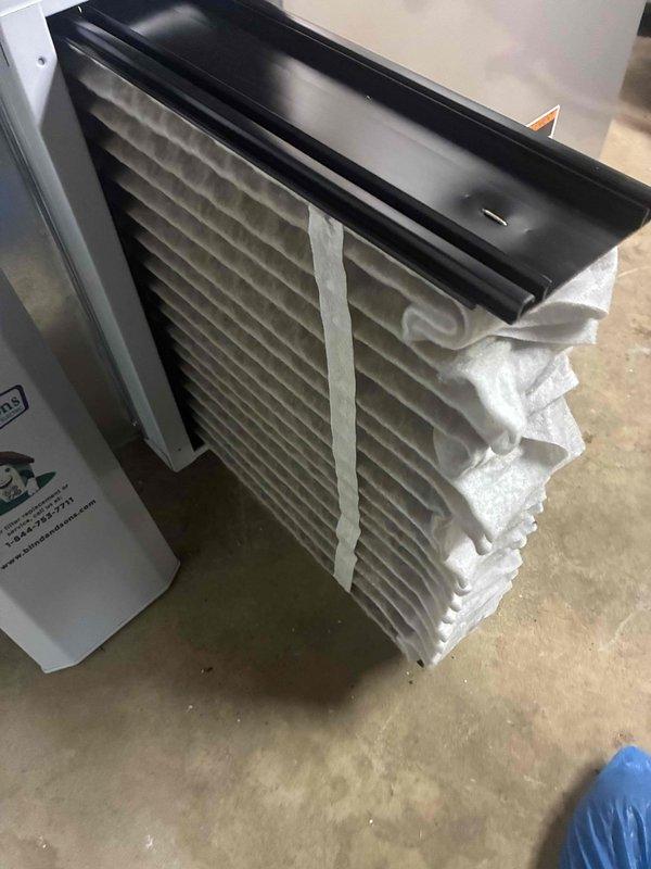 Completed MVP recurring cooling maintenance visit. Inspected and documented condition of indoor air filter, which showed significant dust accumulation and discoloration requiring attention. Evaluated outdoor condenser unit, noting dirt buildup on heat exchanger coils and minor paint deterioration on exterior casing. Photographed equipment conditions for maintenance records.