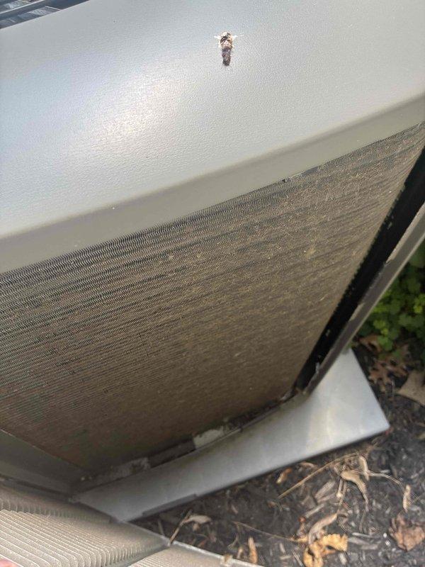 Completed MVP recurring cooling maintenance visit. Inspected and documented condition of indoor air filter, which showed significant dust accumulation and discoloration requiring attention. Evaluated outdoor condenser unit, noting dirt buildup on heat exchanger coils and minor paint deterioration on exterior casing. Photographed equipment conditions for maintenance records.