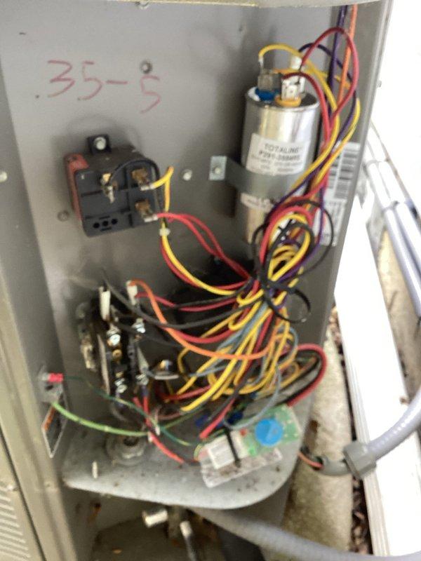 Completed preventive maintenance inspection on residential air conditioning system for MVP customer. Performed visual inspection of indoor air handler unit, verified proper filter access and housing integrity, and documented electrical control panel components including capacitor, contactor, and wiring connections in unit 35-E. All system components observed to be operational with normal wear patterns noted.