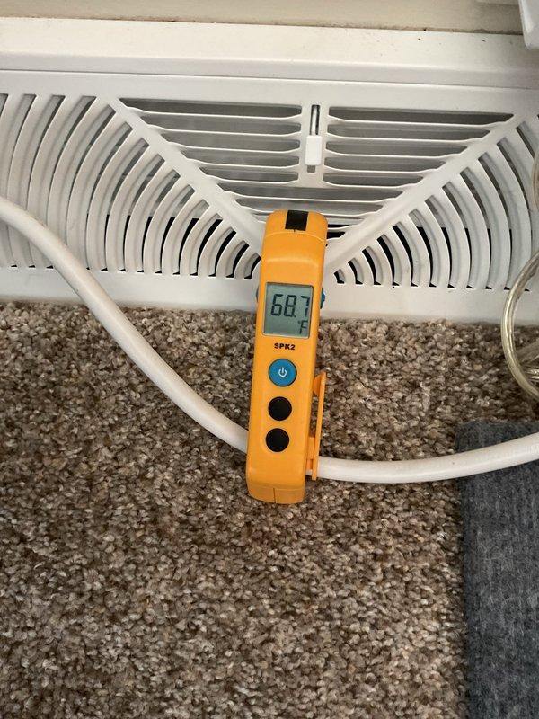 Responded to no cooling complaint with unit running but not providing adequate cooling, indoor temperature reading 80°F or higher. Upon inspection, discovered blown fuses in outdoor condensing unit preventing compressor operation while fan motor continued to run. Replaced failed TR30R 250V AC fuses in fuse holder assembly and verified proper amperage rating. Confirmed supply air temperature at register reading 68°F after repair, restoring normal cooling operation to system.