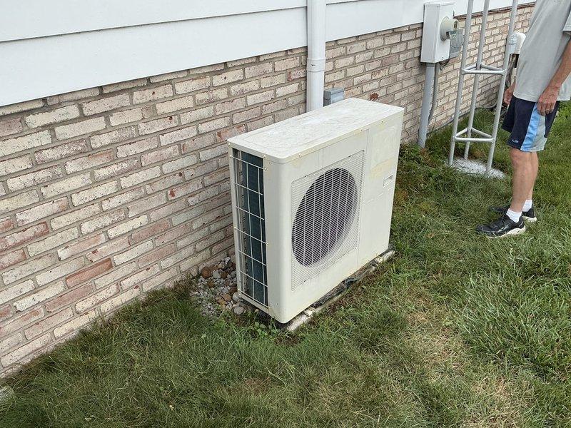 Completed estimate for ductless mini-split system replacement at residential property. Assessed existing outdoor condenser unit and indoor wall-mounted air handler to determine equipment specifications and installation requirements for one to two new mini-split systems pending customer confirmation.