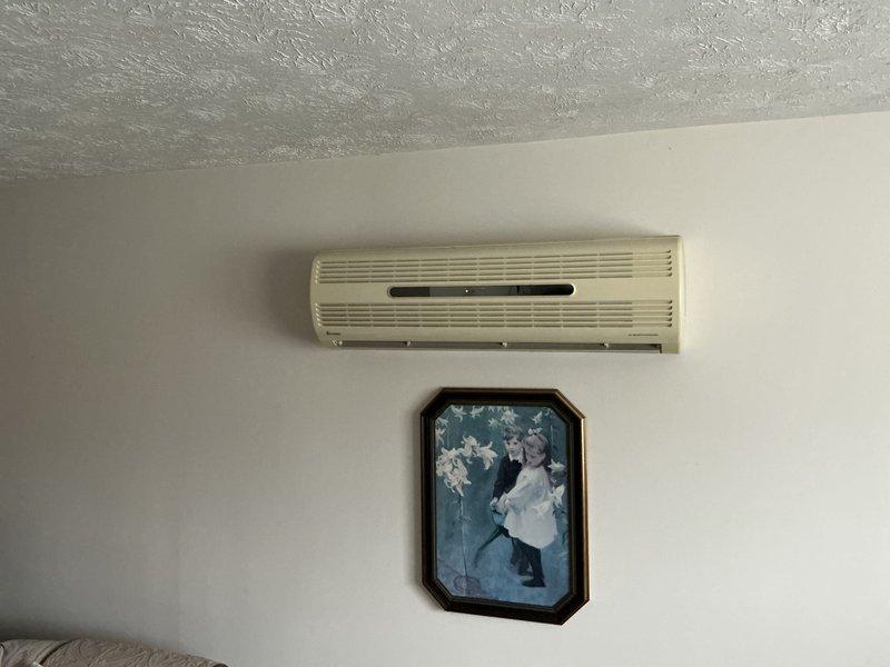 Completed estimate for ductless mini-split system replacement at residential property. Assessed existing outdoor condenser unit and indoor wall-mounted air handler to determine equipment specifications and installation requirements for one to two new mini-split systems pending customer confirmation.
