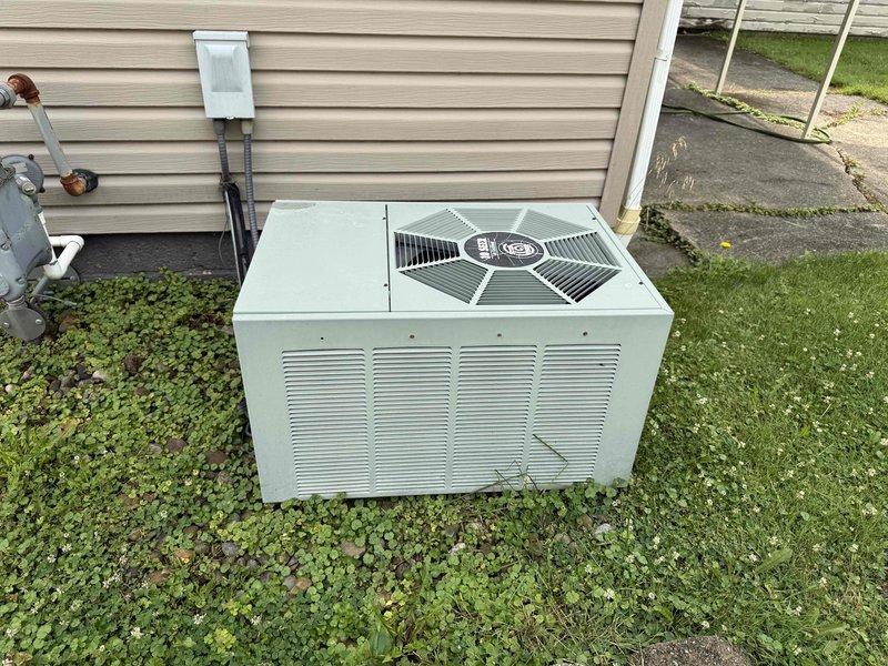 Completed MVP cooling maintenance visit on residential air conditioning system. Performed comprehensive inspection of outdoor condensing unit, including internal components such as compressor, refrigerant lines, electrical connections, and housing condition. Documented equipment condition through photographs showing normal operational wear and seasonal debris accumulation, with all major components functioning within acceptable parameters.