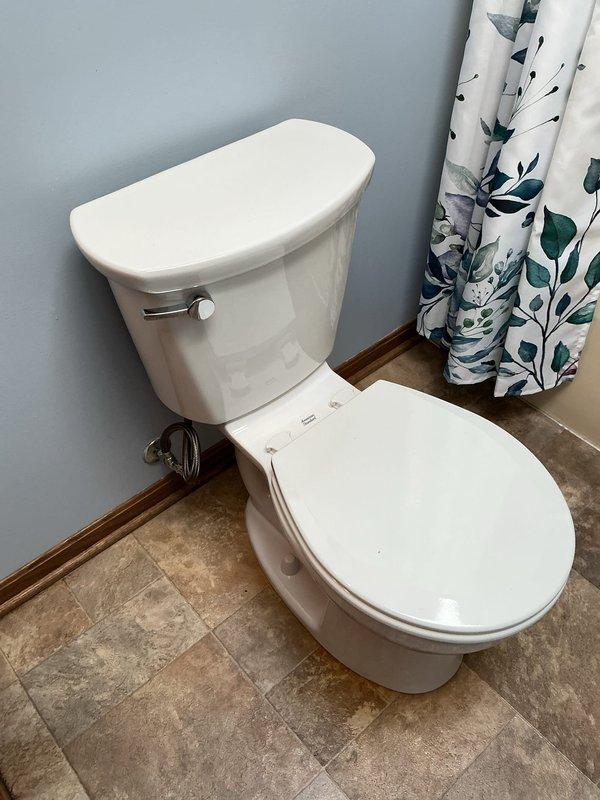 Installed new American Standard Cadet Pro toilet with round bowl and standard 15" height in second floor hall bathroom. Replaced existing toilet and installed new shut-off valve to supply line. Verified proper operation, seal integrity, and tested for leaks upon completion.