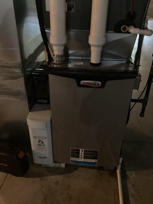 Responded to no cooling complaint with blower motor operational. Performed diagnostic evaluation of split system AC unit including Lennox indoor air handler and outdoor condensing unit. Inspected indoor unit in mechanical room, verified blower operation and airflow at furnace. Proceeded to outdoor condenser unit, tested electrical components and refrigerant system. Identified failed compressor preventing refrigeration cycle from operating properly. Explained findings to customer regarding compressor failure causing lack of cooling despite functional blower operation.