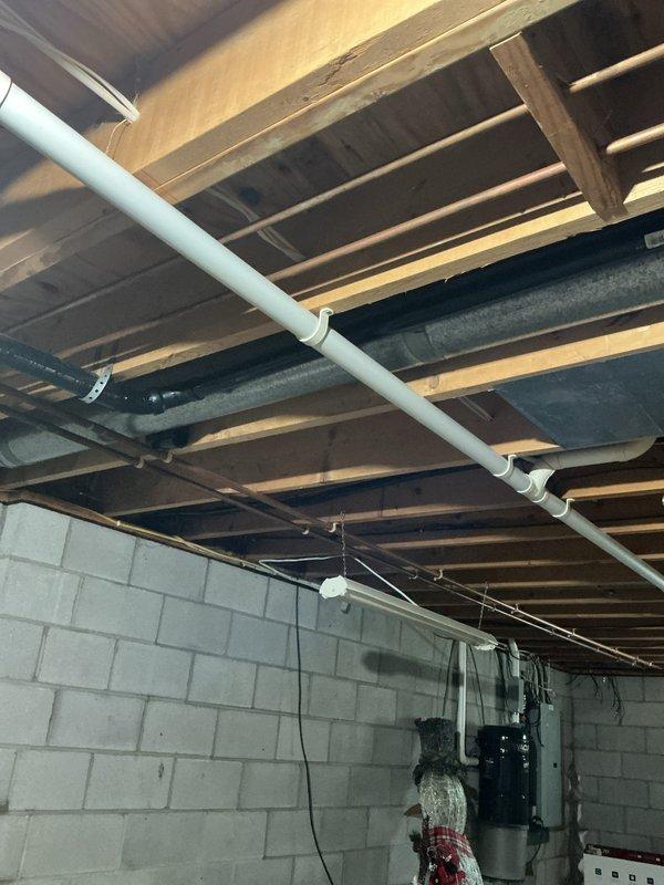 Replaced kitchen drain line to eliminate bellied section in existing ABS piping. Obtained necessary replacement parts and materials, then removed compromised drain section and installed new properly-sloped ABS drainage pipe to restore proper flow and prevent future standing water issues.