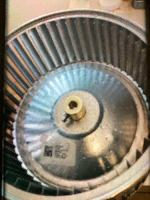 Completed MVP recurring cooling maintenance visit on residential HVAC system. Performed comprehensive inspection of blower assembly and air handler components, documenting condition of squirrel cage fan with visible dust and debris accumulation on blades and hub. Inspected ductwork connections and internal components, noting normal wear consistent with system age and operation.
