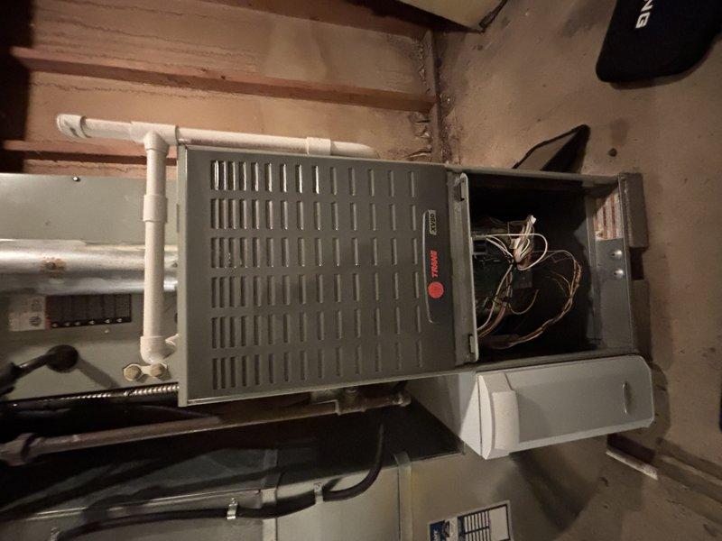 Responded to service call for non-operational air conditioning system on 11-year-old unit. Upon inspection, identified failed electrical connections at outdoor condenser unit requiring replacement of damaged spade terminals with proper heat-shrink insulated connectors. Replaced faulty terminals, restored electrical continuity to compressor circuit, and verified system operation with successful startup and cooling cycle.