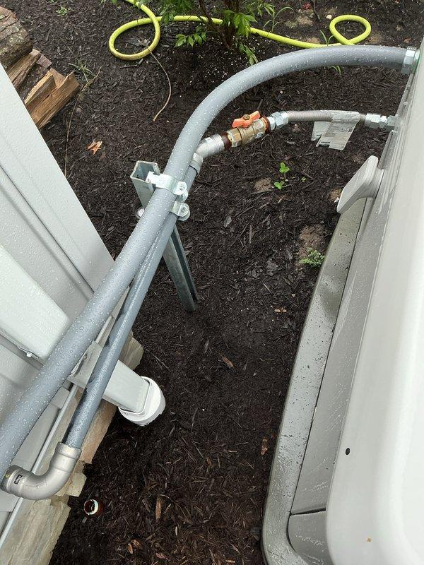 Responded to report of natural gas odor detected near recently installed 22kW generator unit. Upon arrival, performed comprehensive gas leak detection and pressure testing of all gas line connections, fittings, and valves serving the generator installation. Conducted visual inspection of brass service valves, pipe joints, and mounting hardware. Utilized gas detection equipment to test for leaks at all connection points while system was operational. Verified proper installation of gas piping, confirmed secure mounting of all components, and ensured all fittings were properly tightened to manufacturer specifications. No active gas leaks detected during thorough testing of the complete gas delivery system. Documented installation with photographic evidence showing proper pipe insulation, valve placement, and overall system configuration.