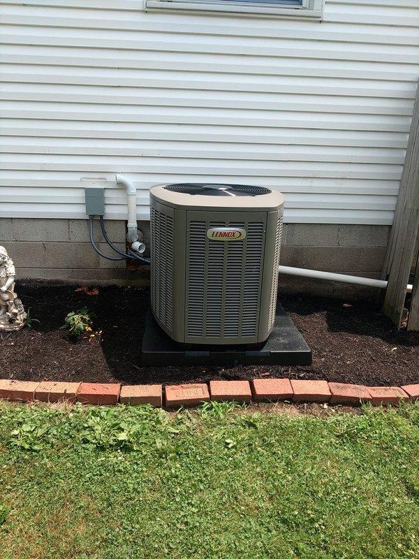 # HVAC Install - Complete System

Completed installation of a 90% efficiency furnace and air conditioning system. Installed new Lennox outdoor condensing unit on concrete pad with proper clearances from structure. Unit positioned on composite isolation pad to minimize vibration transfer. Secured electrical disconnect box to exterior wall and completed all required electrical connections per manufacturer specifications and local code requirements. Routed refrigerant line set and condensate drain piping along foundation. 

Performed system startup and commissioning procedures. Connected digital manifold gauges to verify proper refrigerant charge and system pressures. Confirmed system operating parameters including suction and discharge pressures within manufacturer specifications. Verified proper airflow and temperature differential across indoor coil. Tested all safety controls and operational sequences. System running efficiently with all components functioning as designed.