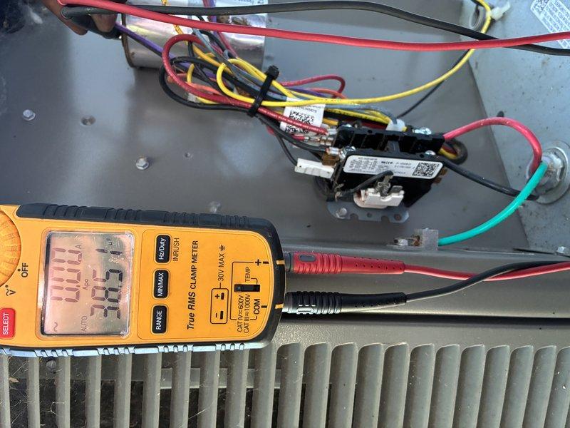 Performed routine preventive maintenance on a three-year-old residential air conditioning system with no reported issues. Conducted comprehensive electrical diagnostics using a digital multimeter to verify proper voltage and amperage readings at the outdoor condensing unit, tested contactor operation, and inspected all electrical connections within the control panel. All components tested within normal operating parameters, and the system is functioning properly for the cooling season.
