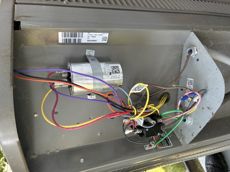Completed routine air conditioning maintenance on a 2-year-old system for an MVP customer. Inspected furnace/air handler unit, verified clean air filter installation, examined electrical connections and capacitor within the outdoor unit, and documented all components with photos showing system in proper working condition.