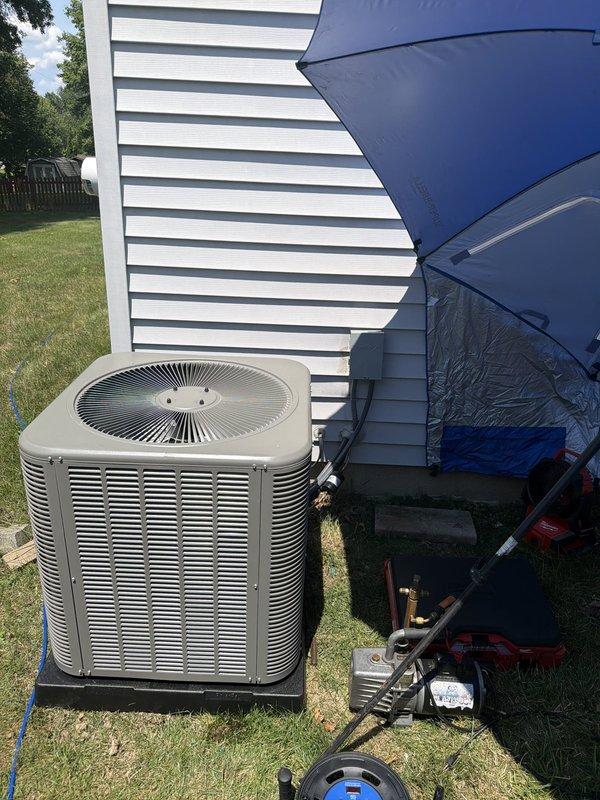 Completed installation of new air conditioning system with matching evaporator coil, achieving 90% furnace efficiency rating. Replaced dual electrical contactor assembly showing oxidation damage and installed new condenser unit on concrete pad. System tested and verified operational with proper refrigerant charge and airflow confirmed through diagnostic equipment.