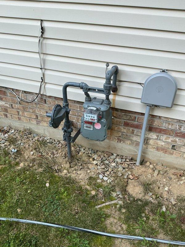 Installed new gas line extension from existing residential gas meter to above-ground pool heating system. Ran black iron pipe from meter location on exterior wall, routing approximately 30-40 feet across property to pool equipment pad where SwimPro pool heater unit was positioned. Connected gas supply line to heater inlet with appropriate fittings and unions for future serviceability. All connections were properly threaded, sealed with approved pipe compound, and pressure tested to ensure system integrity and compliance with local gas code requirements.
