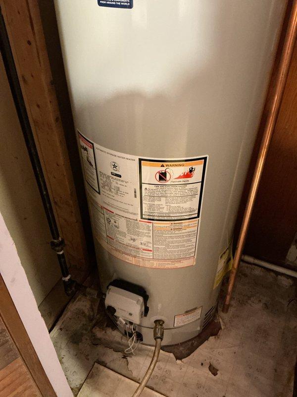 Responded to customer concern regarding bad smell from water in Bradford White tank water heater previously installed in January. Provided customer with installation booklet and documentation for their records. Performed visual inspection of water heater installation, verifying proper connections of copper supply lines, brass fittings, expansion tank, and venting system all remain in good working condition with no visible leaks or defects.