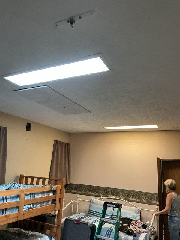 Converted two existing light fixtures to LED lighting in residential garage space. Ordered and installed LED panels to replace outdated fluorescent fixtures, improving energy efficiency and light output. Verified proper operation of both new LED fixtures upon completion.
