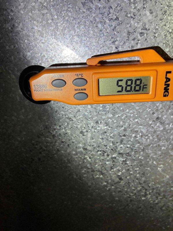 Completed routine AC tune-up on 5-year-old system. Inspected electrical components including run capacitor, wiring connections, and terminal blocks; all found in proper working condition. Recorded operating temperatures with refrigerant line reading 58.8°F, confirming adequate cooling performance.