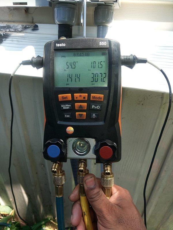 # MOBILE HOME AC 1ST JOB

Completed installation of new air conditioning system with evaporator coil for mobile home application. Installed outdoor condensing unit and indoor evaporator coil assembly. Ran refrigerant line set between outdoor and indoor components. Evacuated system to remove moisture and non-condensables from refrigerant lines. Charged system with appropriate refrigerant type and quantity per manufacturer specifications.

Performed system startup and commissioning procedures. Used Testo 550 digital manifold gauge to verify proper refrigerant pressures and temperatures throughout system operation. Monitored suction and discharge pressures to confirm system was operating within normal parameters. Checked superheat and subcooling values to ensure proper refrigerant charge. System operating efficiently with appropriate temperature splits and pressures. All electrical connections verified and secured. Unit tested and left in proper working condition.