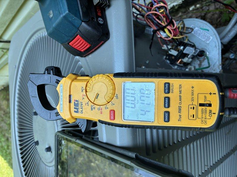 Completed comprehensive tune-up on 6-year-old residential air conditioning system. Performed electrical diagnostics using clamp meter to verify proper amperage draw and voltage levels at outdoor condensing unit, confirming system operating within manufacturer specifications. Inspected wiring connections, tested capacitor performance, and evaluated overall system operation to ensure optimal cooling efficiency for the season.