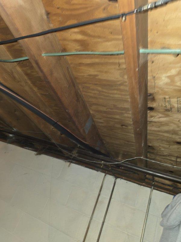 Completed installation of new air conditioning system and evaporator coil in attic space. Installed outdoor condensing unit, indoor air handler with evaporator coil, refrigerant line set with proper insulation, condensate drain line, electrical wiring and disconnect, and thermostat control system. All refrigerant lines were properly brazed, pressure tested, and system was evacuated and charged to manufacturer specifications. Verified proper airflow, temperature split, and all safety controls are functioning correctly. System is operational and ready for use.