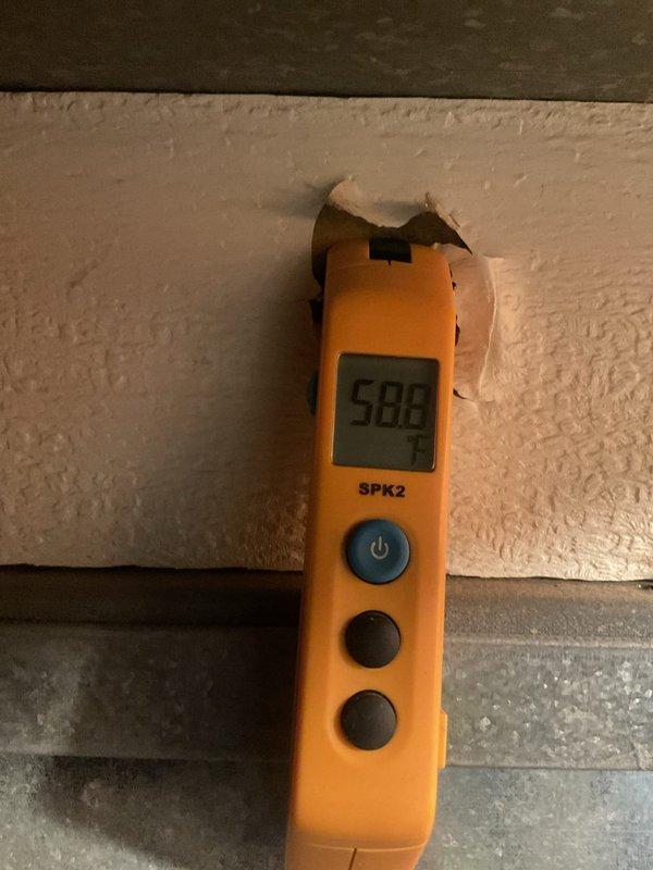 Completed MVP cooling maintenance visit on residential HVAC system. Performed temperature diagnostics using digital thermometer, recording supply air temperature of 58.8°F at register and measuring temperatures at air handler/ductwork to verify proper system operation and adequate cooling performance.