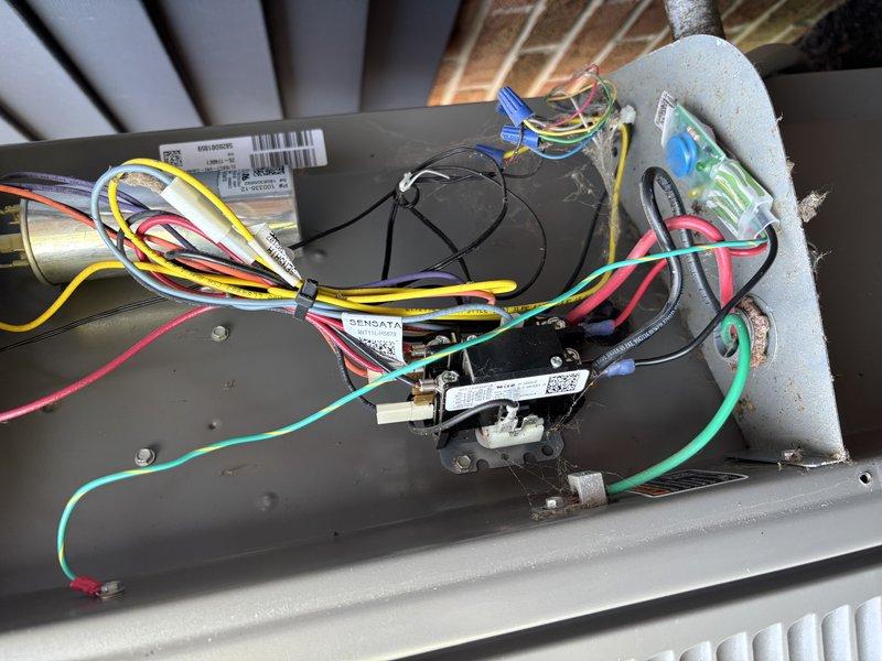 Completed comprehensive AC tune-up on five-year-old system, including inspection of outdoor condenser unit and indoor air handler components. Removed access panel to examine electrical connections, capacitor, and relay; all wiring properly secured and connections intact. Discussed annual maintenance plan enrollment with customer.