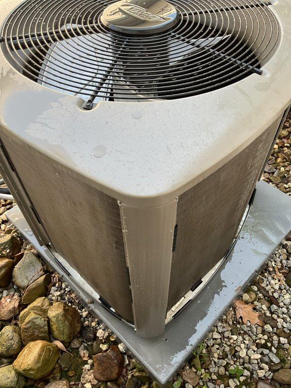 Completed MVP cooling maintenance visit on residential HVAC system. Inspected outdoor condenser unit, which showed normal weathering consistent with outdoor exposure. Unit is properly positioned on concrete pad with adequate clearance and drainage. Refrigerant lines and electrical connections were visually inspected and found secure.

Replaced heavily soiled air filter that exhibited significant particulate accumulation and discoloration, which was restricting airflow and reducing system efficiency. New filter installed to restore proper air circulation through the system.

Addressed customer concern regarding thermostat temperature discrepancy. Inspected thermostat operation and calibration to diagnose reading accuracy issue. System operational upon completion of maintenance service.