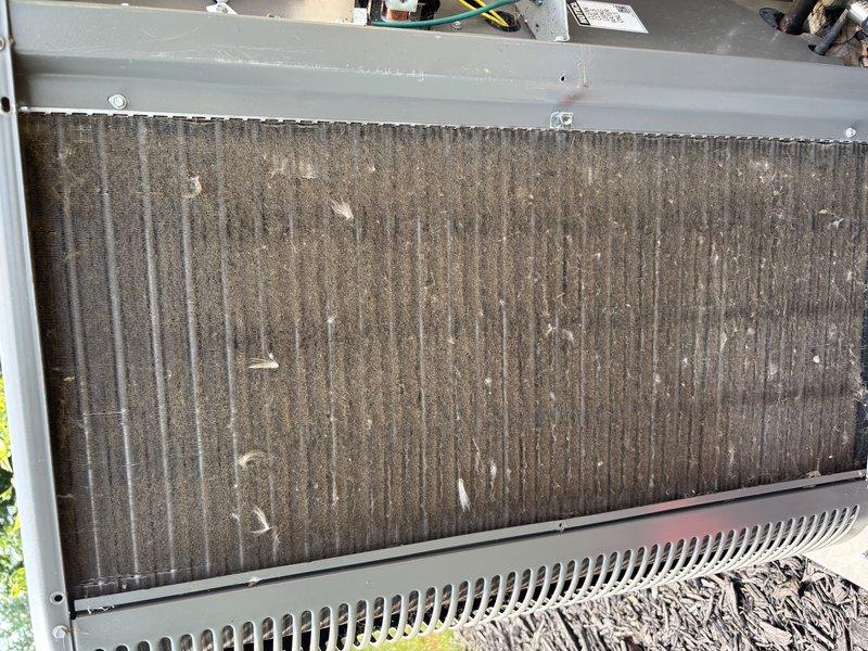 Completed routine maintenance on 3-year-old residential air conditioning system. Identified severely clogged air filter with heavy dust and debris accumulation affecting system efficiency. Inspected outdoor condenser unit and evaluated ductwork condition to determine need for professional duct cleaning services.