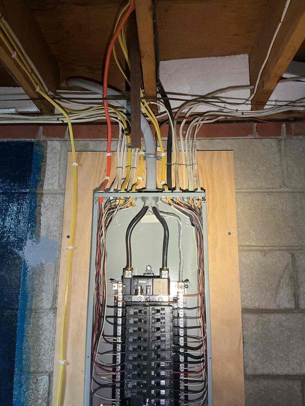 Conducted comprehensive electrical estimate for generator installation at residential property. Assessed existing electrical panel configuration, main service entrance conductors, and available circuit capacity in basement utility area to determine requirements for backup generator integration. Documented current electrical infrastructure including breaker panel layout, wire routing through floor joists, and available mounting locations for transfer switch installation.