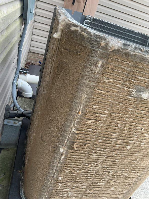 Responded to service call for defective April Air system. Upon arrival, performed diagnostic assessment of outdoor condensing unit and indoor components. Unit exterior showed significant dirt and debris accumulation on coil fins and casing. Utilized digital measuring instrument to obtain temperature and humidity readings, recording 55.5 degrees at measurement point. Inspected refrigerant lines, electrical connections, and condensate drainage system. Documented current system condition with photographic evidence showing soiled outdoor unit and diagnostic equipment readings. System requires further evaluation to determine specific component failure and recommended repairs.